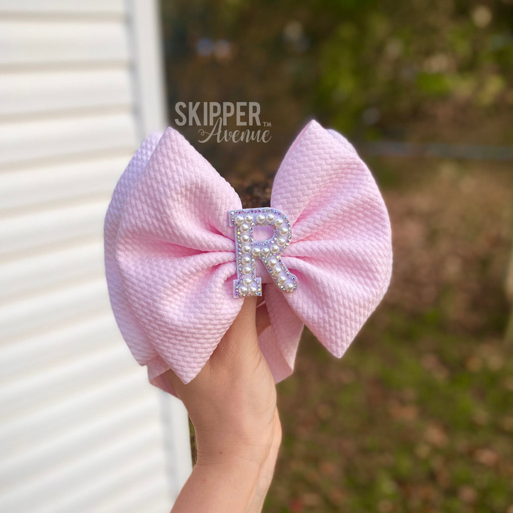 INITIAL SIGNATURE BOWS